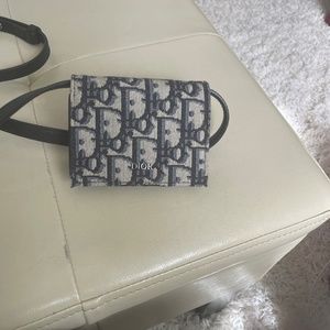 Mini Dior pouch with a strap